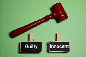 PhotoConceptOnGuiltyAndInnocentInJudgesTrialCourt