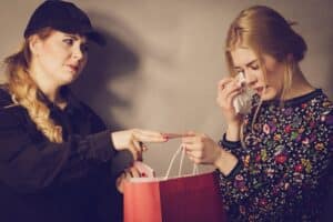 ShopliftingIsACrimeTeenageGirlBeingCaughtOnStealing
