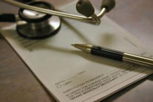 PrescriptionPadWithPenAndScope