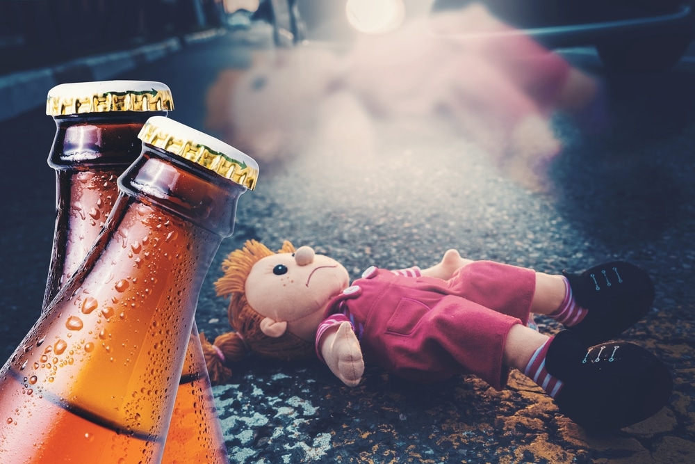 TrafficAccidentClose-upOfTwoBottlesOfBeerAgainstThe TrafficAccidentClose-upOfTwoBottlesOfBeerAgainstThe