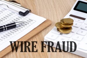 WireFraudTextWithChartAndCalculatorAndCoins